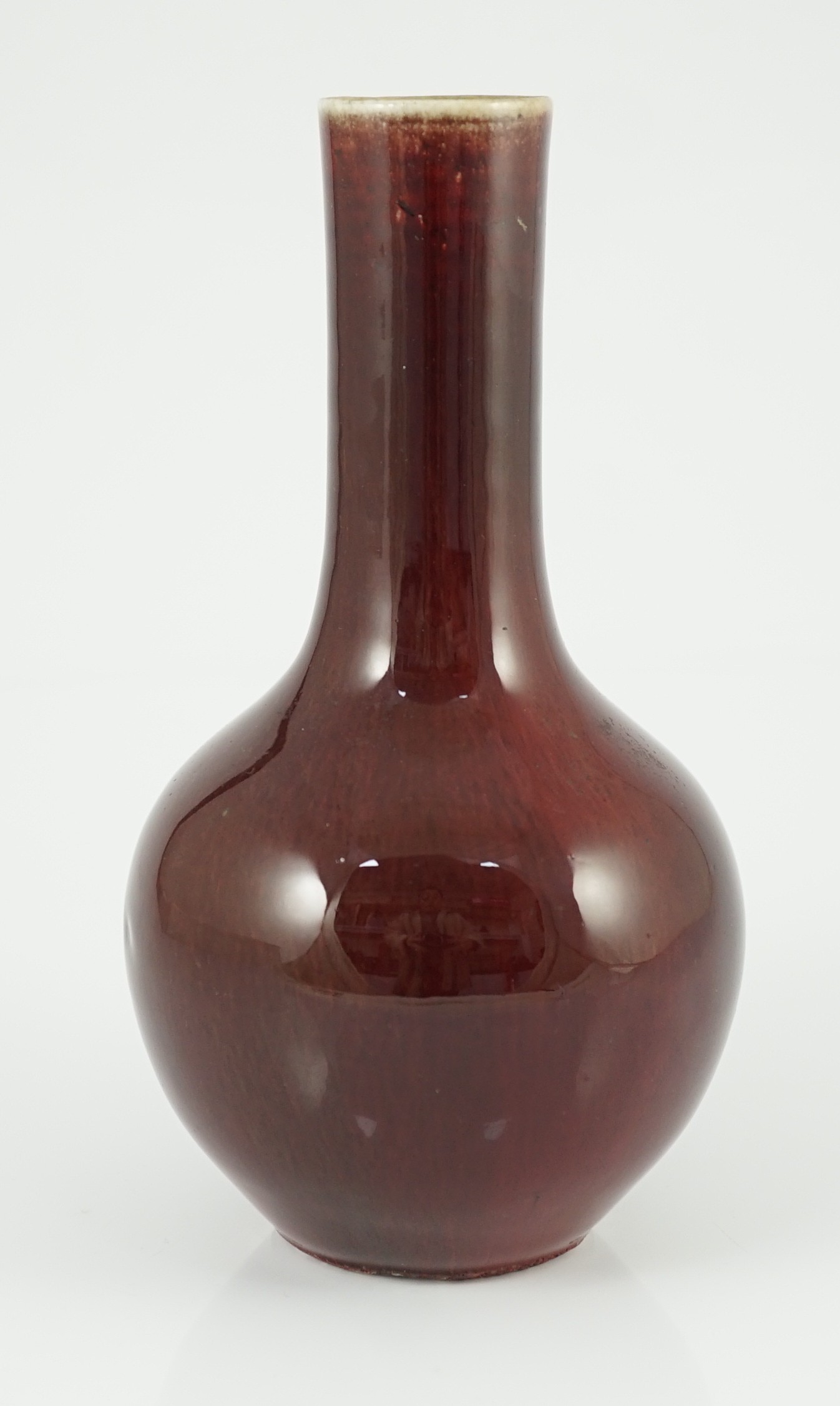 A Chinese sang-de-boeuf glazed bottle vase, 18th/19th century, 22.5cm high